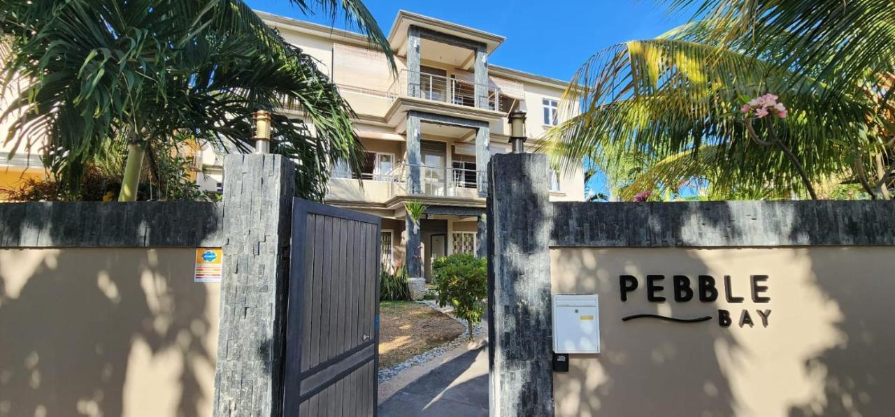Number 5, Pebble Bay Appartments Гранд-Бэй Экстерьер фото