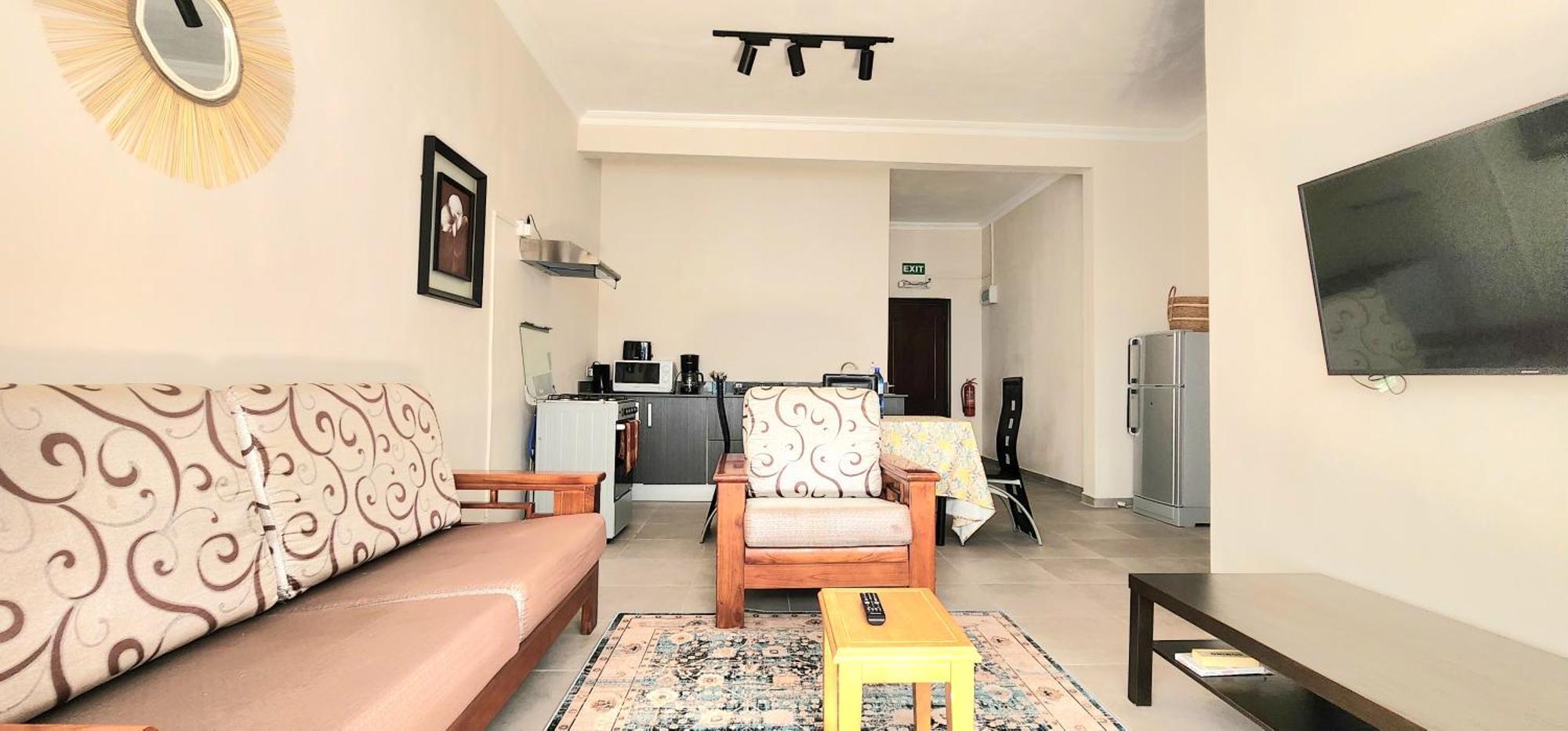 Number 5, Pebble Bay Appartments Гранд-Бэй Экстерьер фото